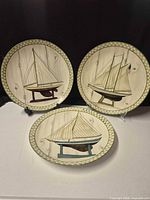 All three sailboat dinner plates grouped