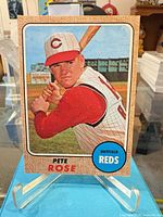 Front view of 1968 Topps Pete Rose card on stand