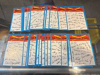 Spread of 1973 Topps team checklist cards, two rows showing multiple teams