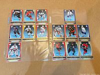 Full view of two binder pages showing 14 Rookie Review cards