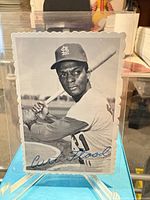 Front view of Curt Flood scalloped-edge postcard in sleeve