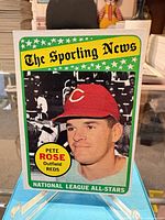 Front view of Pete Rose The Sporting News #424 card on stand