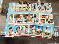 Overall view of lot showing all cards laid out