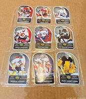 All nine Hot Gloves cards in a single nine-pocket sleeve