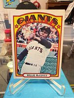 Front of Willie McCovey Topps card on stand