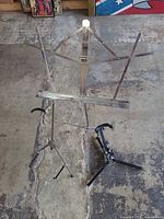 Overall view of all three stands—sheet-music stand centered, two instrument stands below