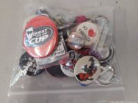 Bag of assorted buttons and a few key rings