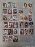 Overview of four binder pages showing various Boston Red Sox cards