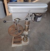 Full view of Brico SL-M5S drill press showing head, motor, column, table and base