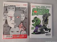 Hawkeye Annual #1 and The Incredible Hulk #77, both bagged and boarded