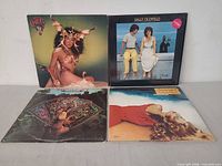 Group shot of all four album covers
