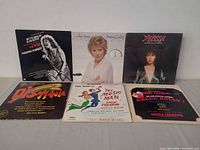 All six record sleeves front view