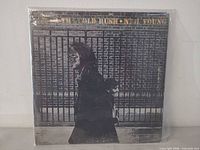 Front of gatefold jacket in protective sleeve