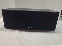 Front view of Paradigm Monitor SE 2000C with grille in place