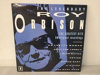 Front cover with title, artist name and featured songs
