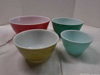 All four Pyrex bowls showing size and color assortment