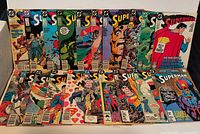 All 20 Superman comics laid out front and back rows