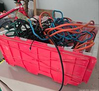 Pink tote filled with assorted coloured cords