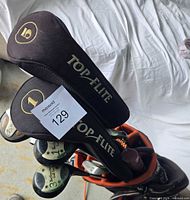 Top Flite headcovers over woods inside bag