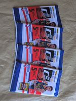 Four sealed 2020-21 Panini Donruss Basketball packs front view