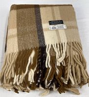 Folded plaid wool throw displaying fringe and overall pattern