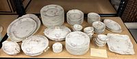 Entire 83-piece Haviland Limoges set displayed on shelf
