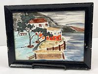 Front view of framed hand-painted tile
