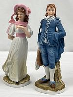 Full view of both porcelain figurines front
