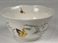 Overall view of Lenox porcelain bowl with butterfly and bee motifs