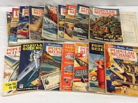 Group shot of all magazines spread in two rows