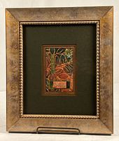 Full shot of framed quilted postcard artwork