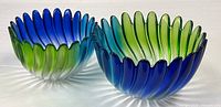 Both gradient blue-green petal bowls side by side