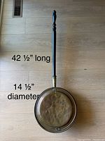Full view of bed warmer showing overall length and pan diameter