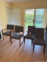 Group image of all four chairs showing styles and upholstery