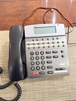 Front view of one NEC Dterm 80 phone showing handset, keypad and display