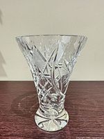 front view of flared cut crystal vase showing starburst cuts