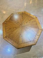 top view showing octagonal shape, veneer grain pattern