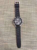 Front view of Ritmo watch showing dial, bezel, entire strap