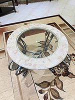 Top view showing glass center, stone rim, overall shape