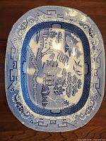 Full view of platter showing Blue Willow pattern and shape