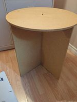 particleboard X-base and round board component