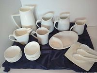 Full grouping of porcelain pieces on cloth