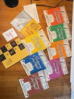 All booklets spread out showing covers and quantity