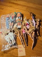Group shot of all dolls showing quantity and condition