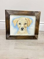 Full view of framed watercolor dog portrait