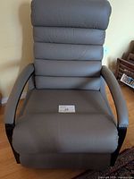 Front view of gray La-Z-Boy recliner showing full chair and arms