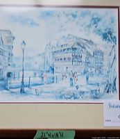 Riverside street scene print in wood frame