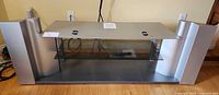 Front view of entire TV stand showing overall design and dimensions