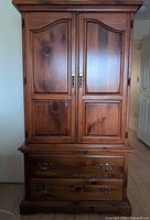 Front view of closed armoire