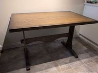 full view of oak trestle table
